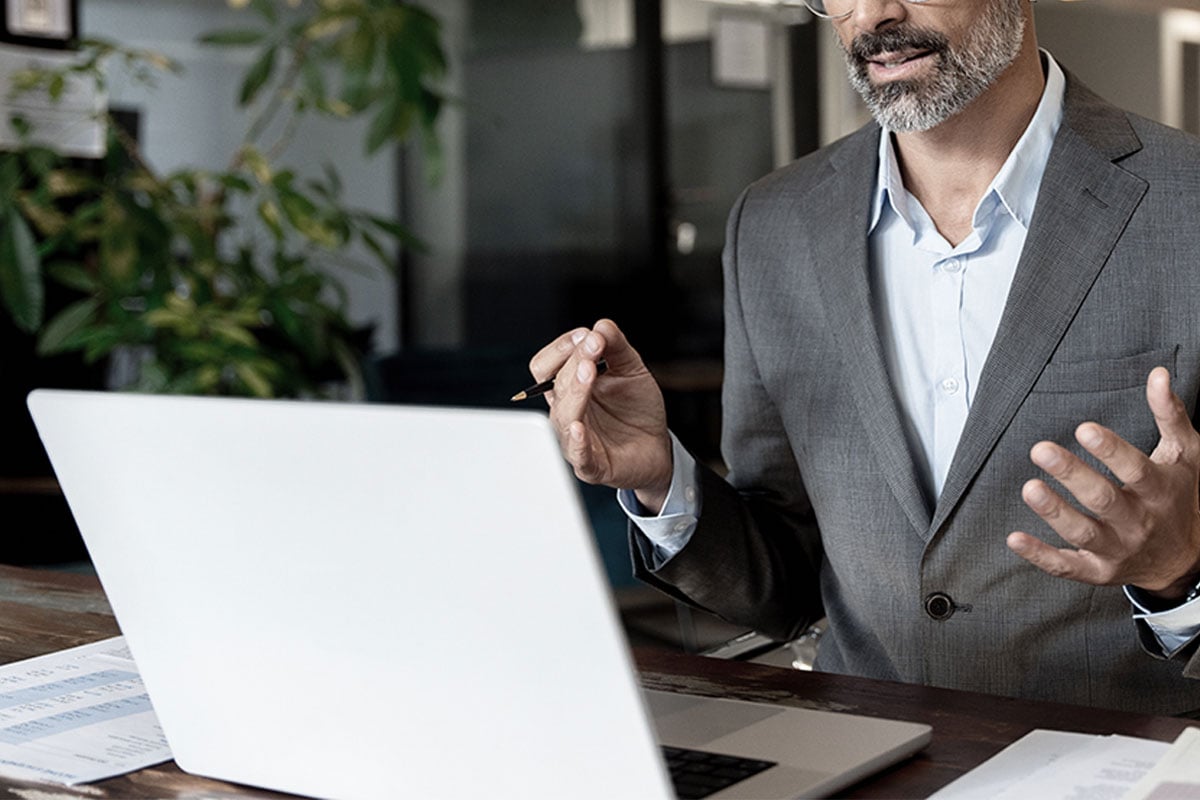 vCISO providing cybersecurity guidance and governance during remote consultation.