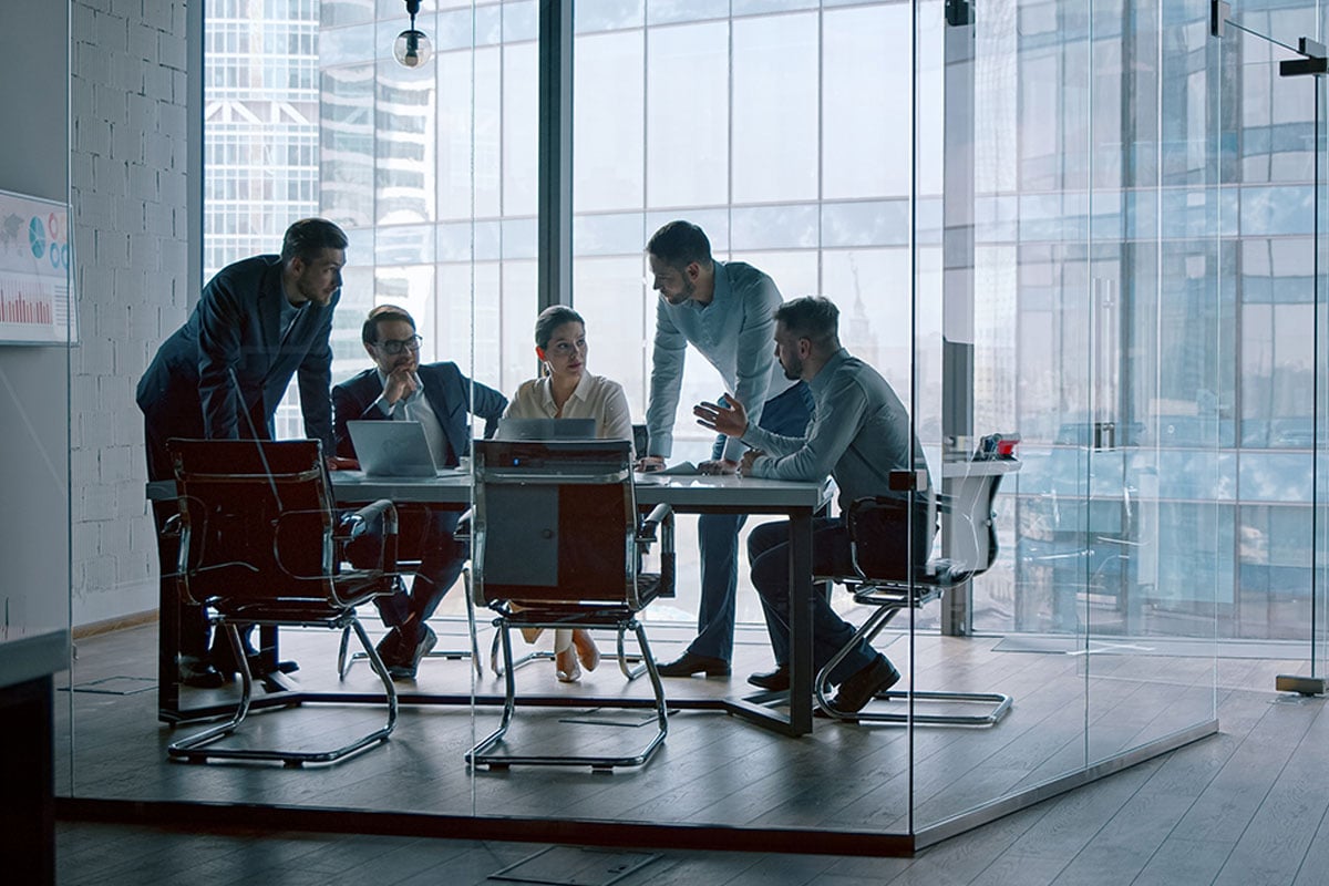 Virtual CISO guiding executive team through strategic planning session.