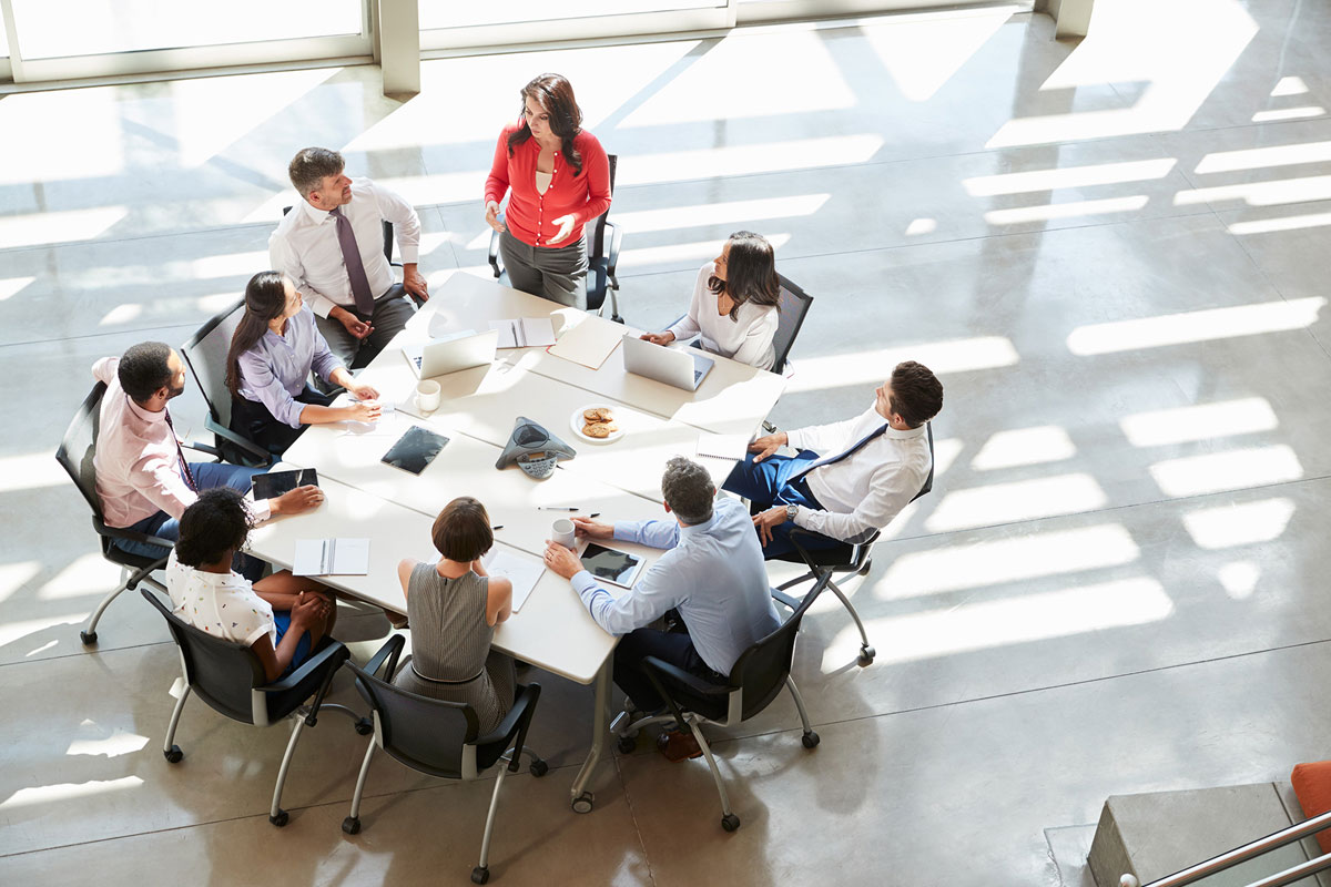 Leadership team discussing cybersecurity strategy and risk management.